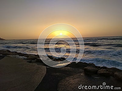 Sunset on the European beach Stock Photo